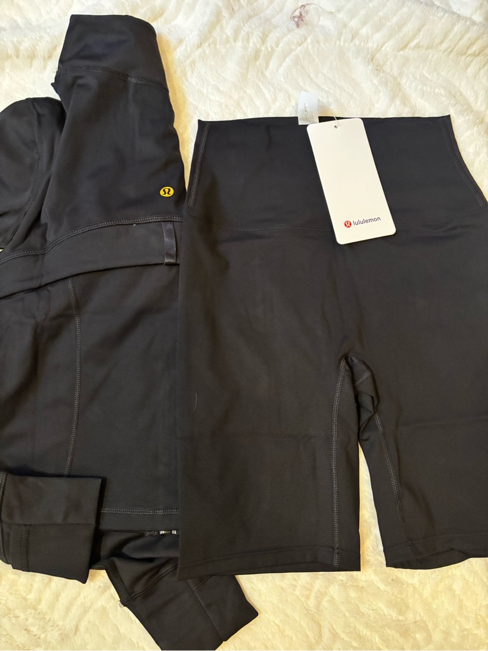 lululemon athletica Black and Gold Cropped Zip-Up Nulu Jacket with Black Shorts